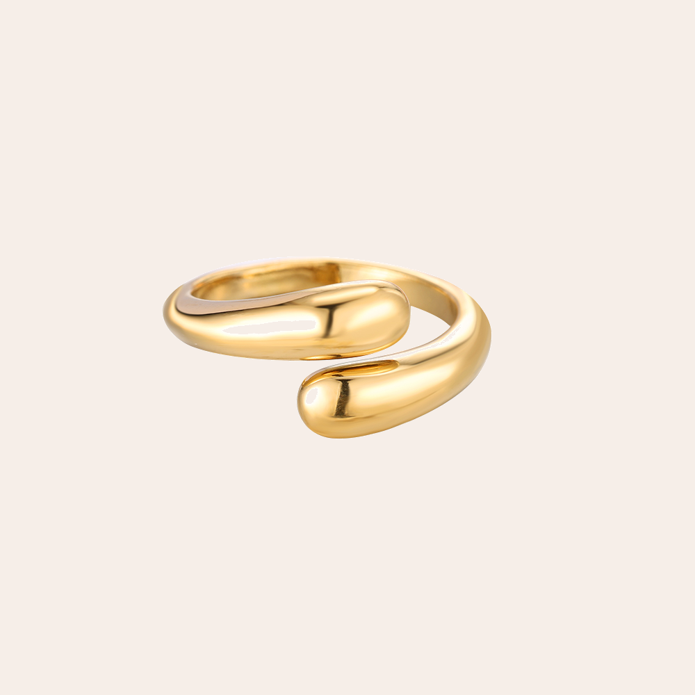 Goldener Edelstahlring mit geschwungenem, offenen Design, glänzende Oberfläche, inspiriert von Umarmungsmotiv