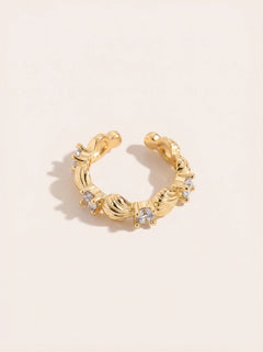 Viele Muscheln mit blauer Zirkonia Vergoldete Ear-Cuffs
