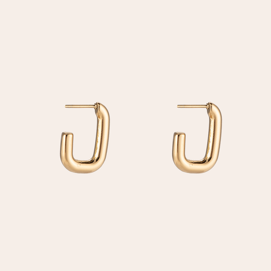Goldene Edelstahl-Ohrringe in geschwungener Form, glänzendes Finish, minimalistisch und modern gestaltet