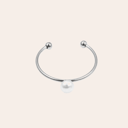 Silberner Edelstahlring mit einzelner Perle, offenes Design, minimalistisch und elegant