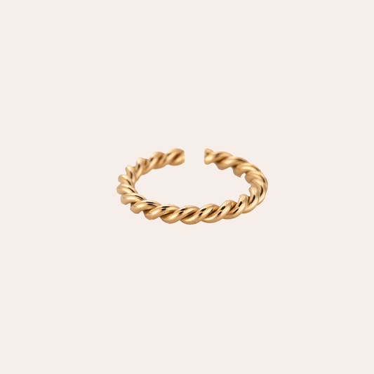Goldfarbener Edelstahlring mit gedrehter Struktur, offene Form, minimalistisches Design